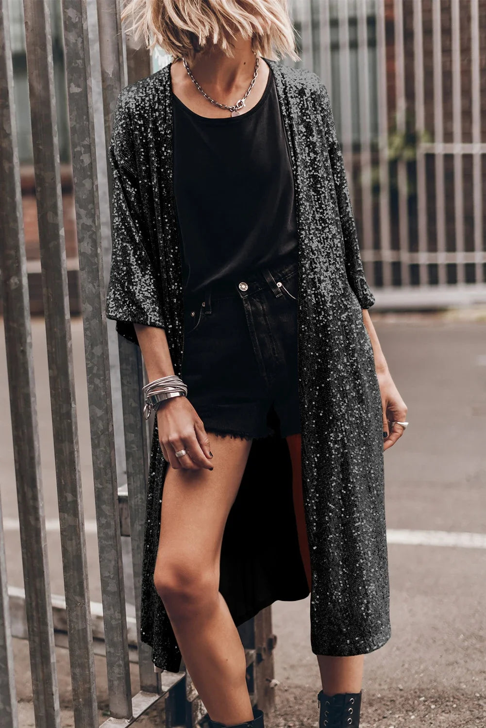 Wrap yourself in celestial elegance with the Celesta Spark Cardigan-where comfort meets captivating shimmer